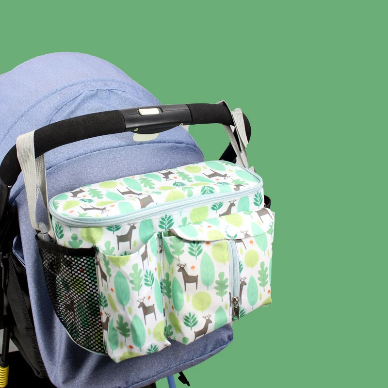 Organizador de pañales con diseño de dinosaurio