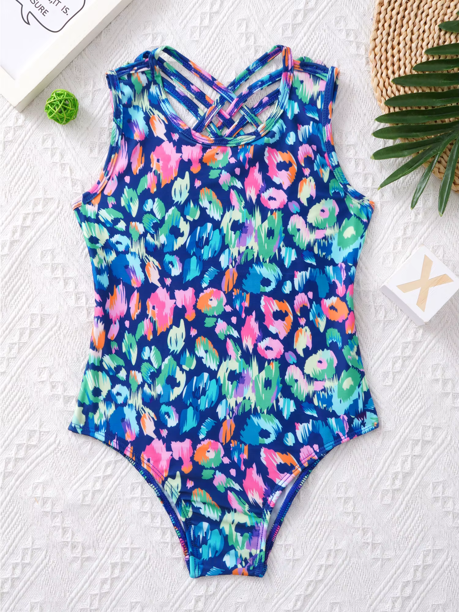 Bañador de una pieza para niñas con estampados y espalda cruzada
