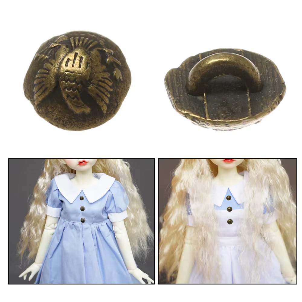 Hebillas aplicadas en ropa de muñeca