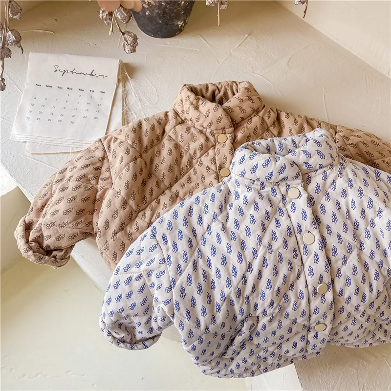 Detalle del abrigo y caída de la prenda