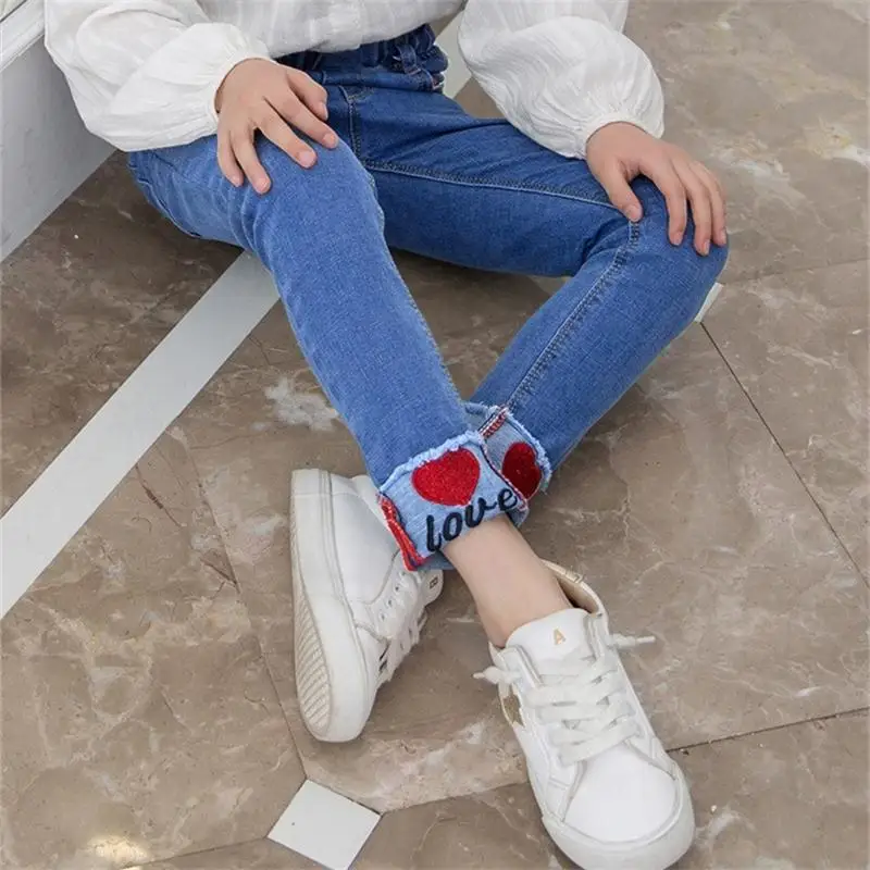 Pantalones largos informales de niña con cintura elástica