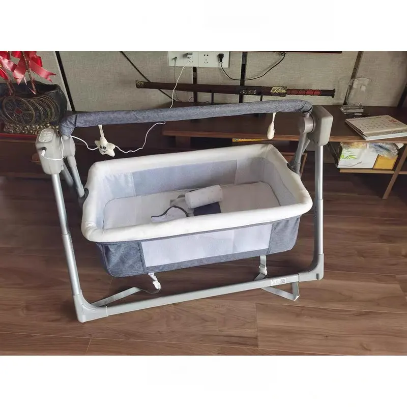 Cuna basculante automática con música y movimientos para bebé