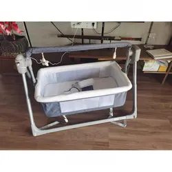Cuna basculante automática con música y movimientos para bebé