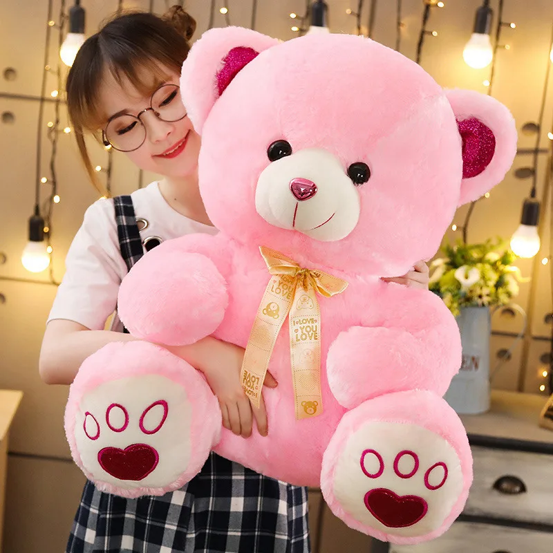 Oso de peluche Huggale modelo XL con diseño de dibujos animados