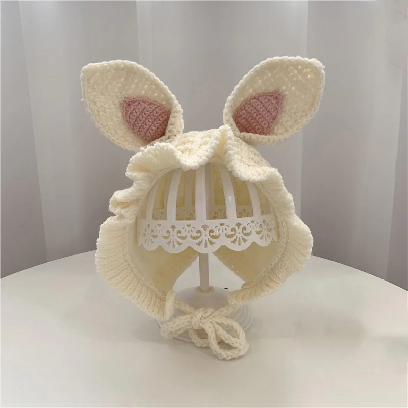 Gorro invierno bebé niña en tejido cálido con protección oídos