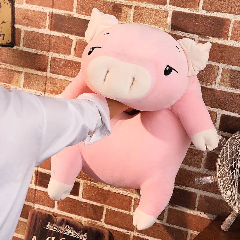Peluche de cerdito rosa en formato almohada