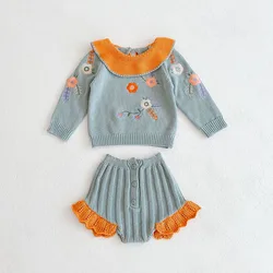 Conjunto de punto para bebé con suéter de volantes y bombacho