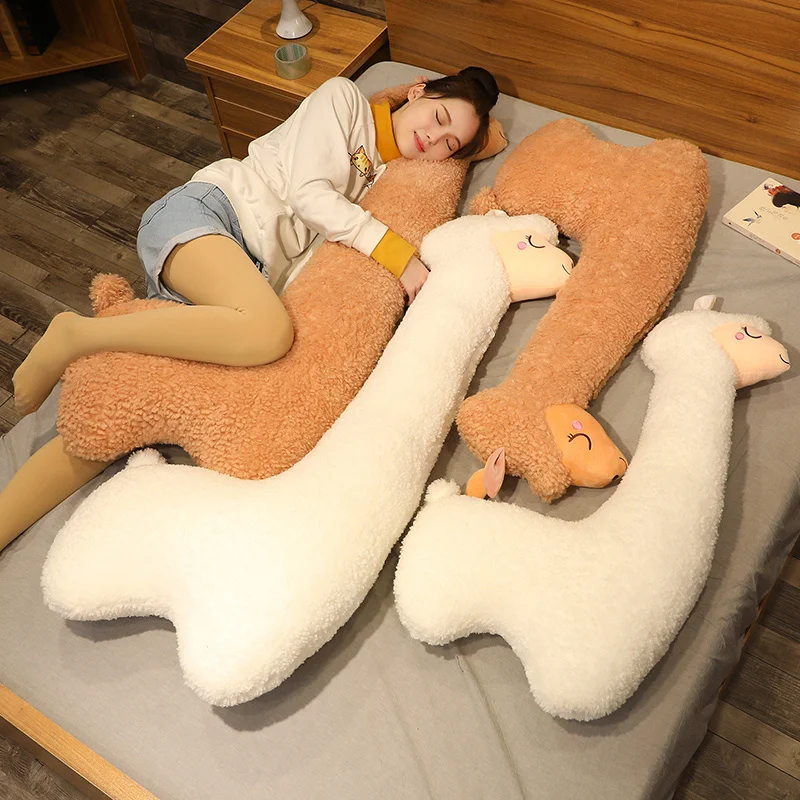 Peluche alpaca/llama de gran tamaño en cama