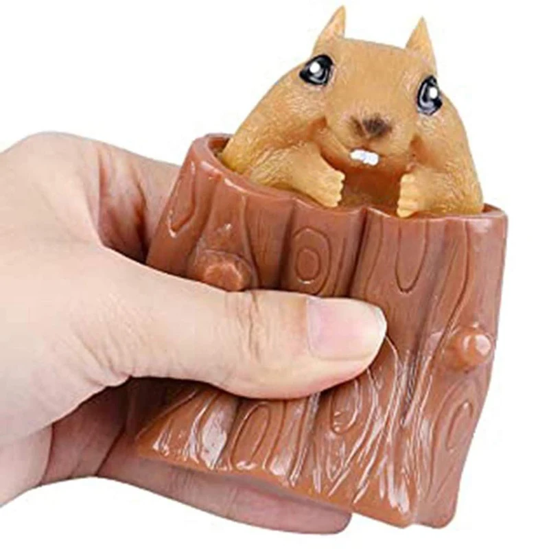 Juguete de descompresión con forma de tocón de árbol y ardilla