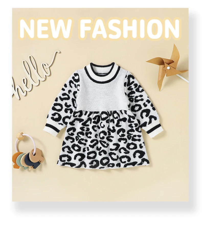 Bebé con suéter de leopardo