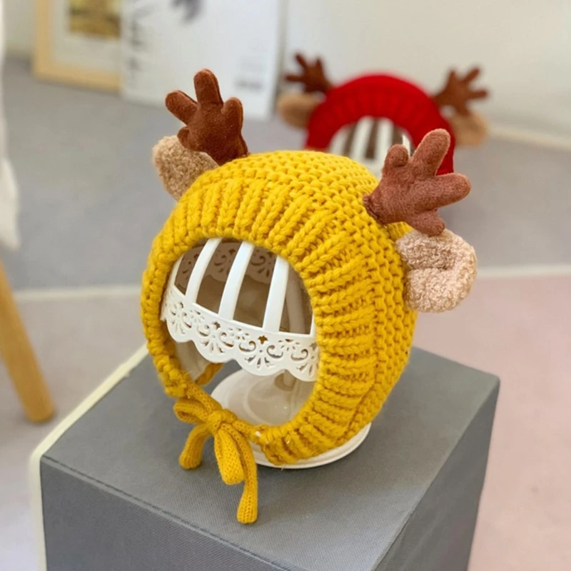 Gorro de lana con orejeras y diseño de reno para bebé