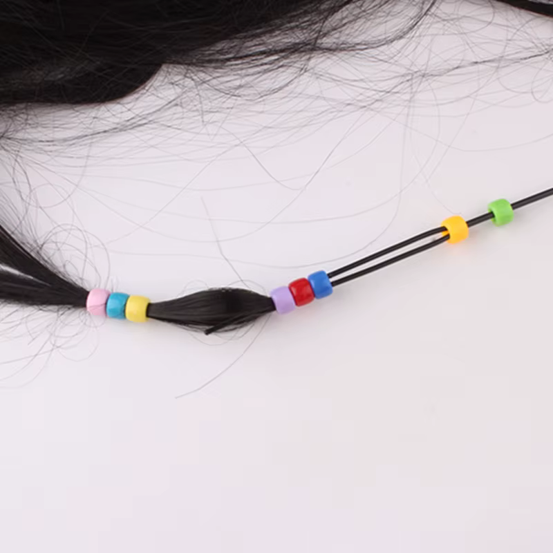 Uso de la aguja para tirar del pelo