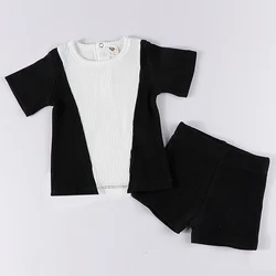 Conjunto verano bebé niño top acanalado negro y pantalón corto