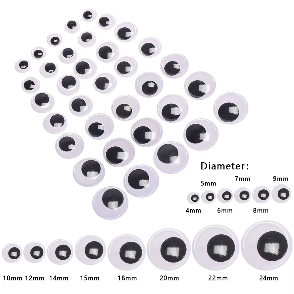 Ojos de dinosaurio en diferentes tamaños sobre superficie neutra