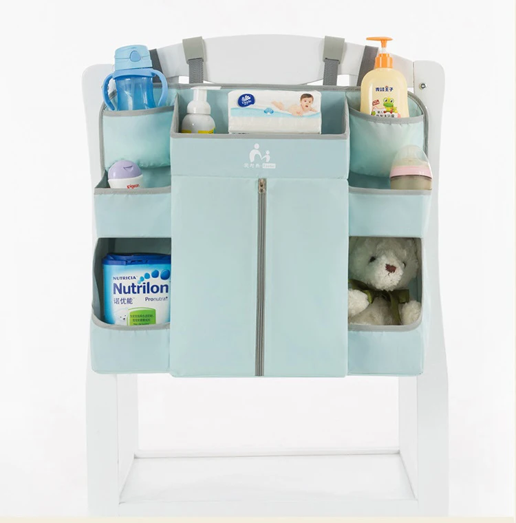 Organizador colgante de pañales para la cuna del bebé