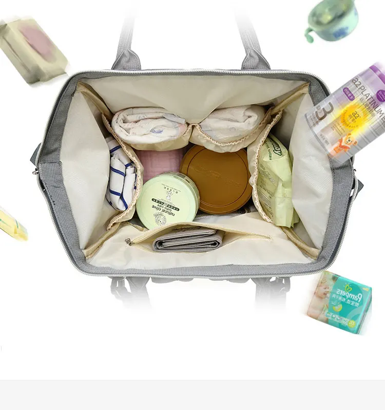 Mochila enganchada a un carrito de bebé