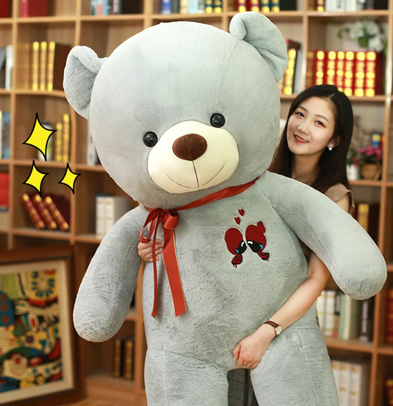 Oso de peluche grande con lazo