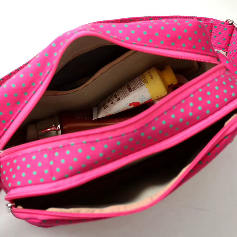 Bolsa de pañales portátil con patrón de puntos para carrito de bebé