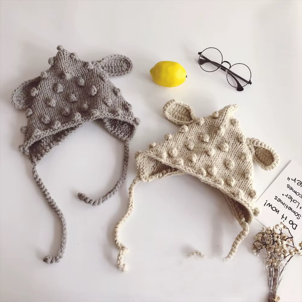Gorro infantil con pompón en diferentes colores