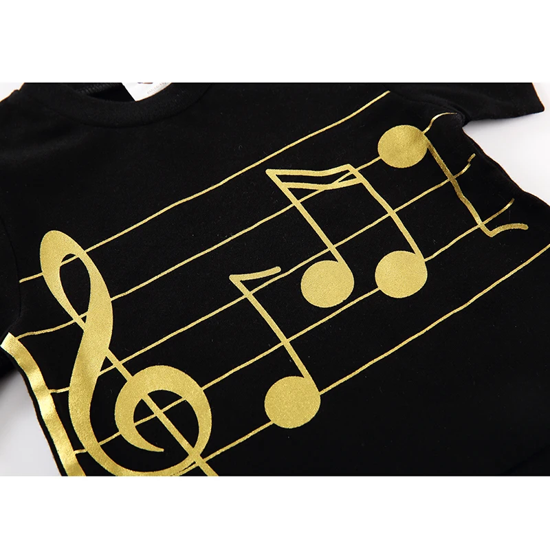 Body para bebé de manga larga en negro con estampado musical dorado - imagen 3