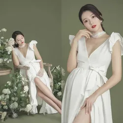 Vestido de maternidad blanco para sesión de fotos de embarazo