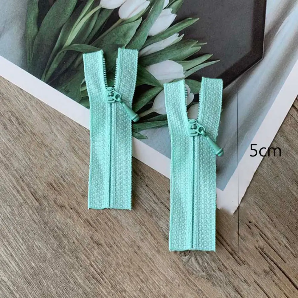 Aplicación en ropa de muñeca