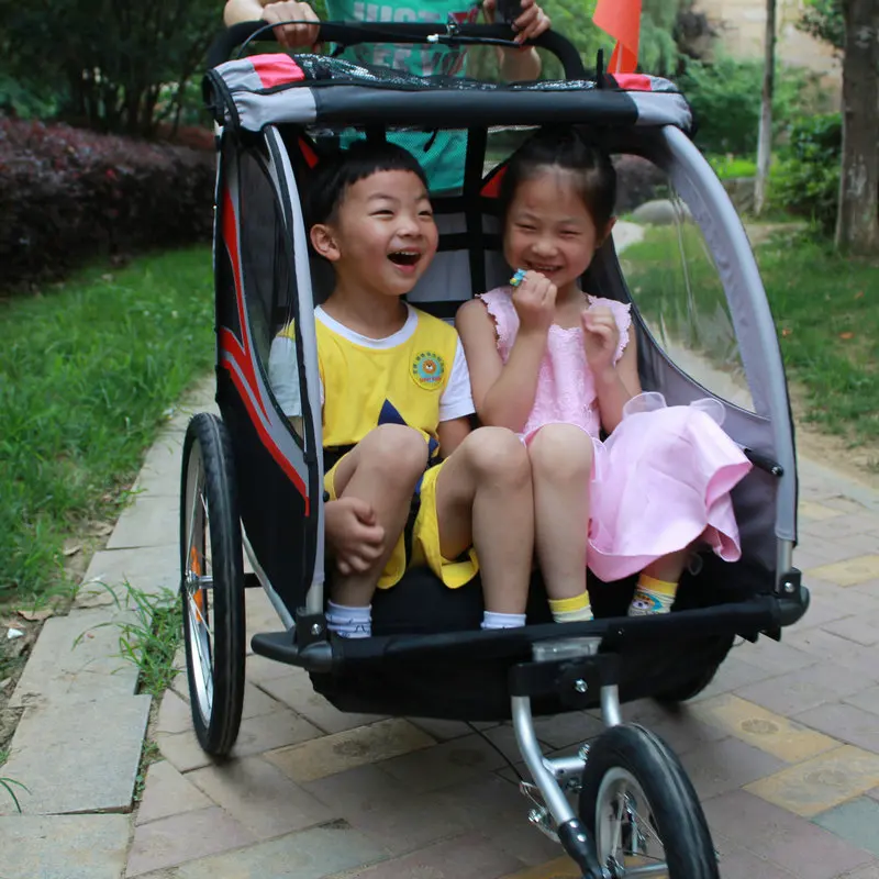 Remolque infantil para bicicleta dos en uno con ruedas inflables - imagen 2