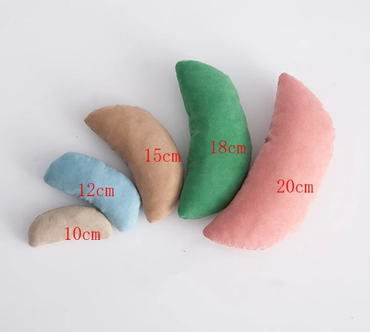 Almohada media luna para recién nacido
