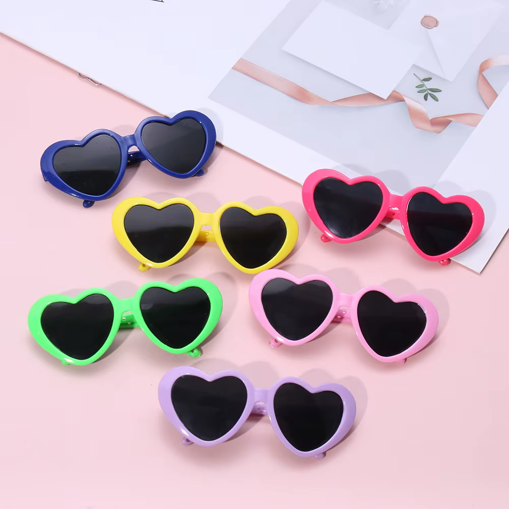 Gafas puestas en muñeca de colección