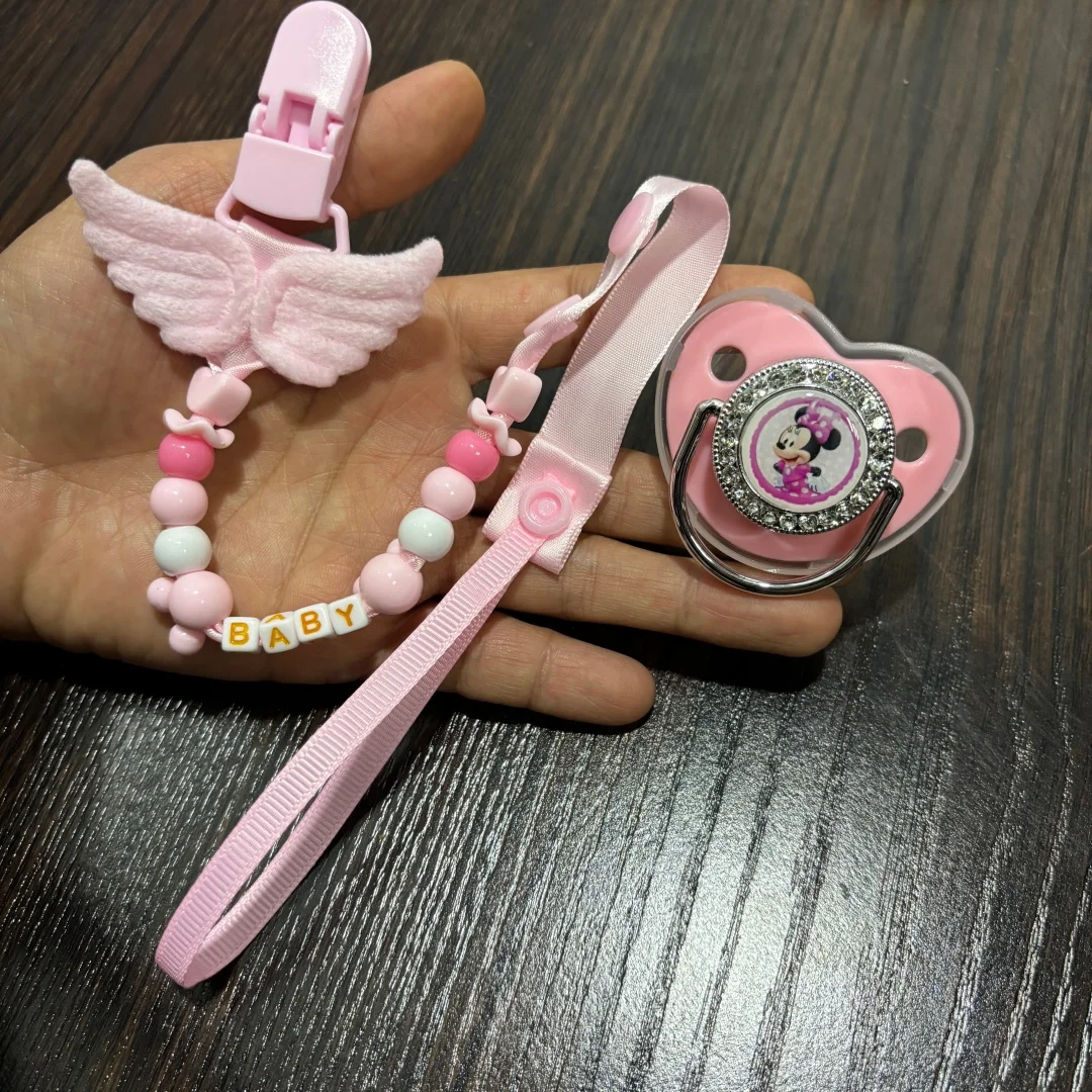 Chupete Comfort antipolvo con clip universal y dibujos animados