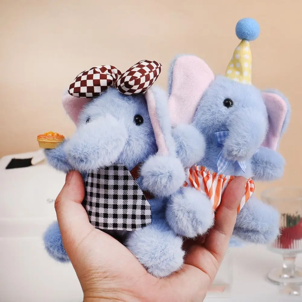 Mochila infantil con elefante de peluche y delantal de pintor