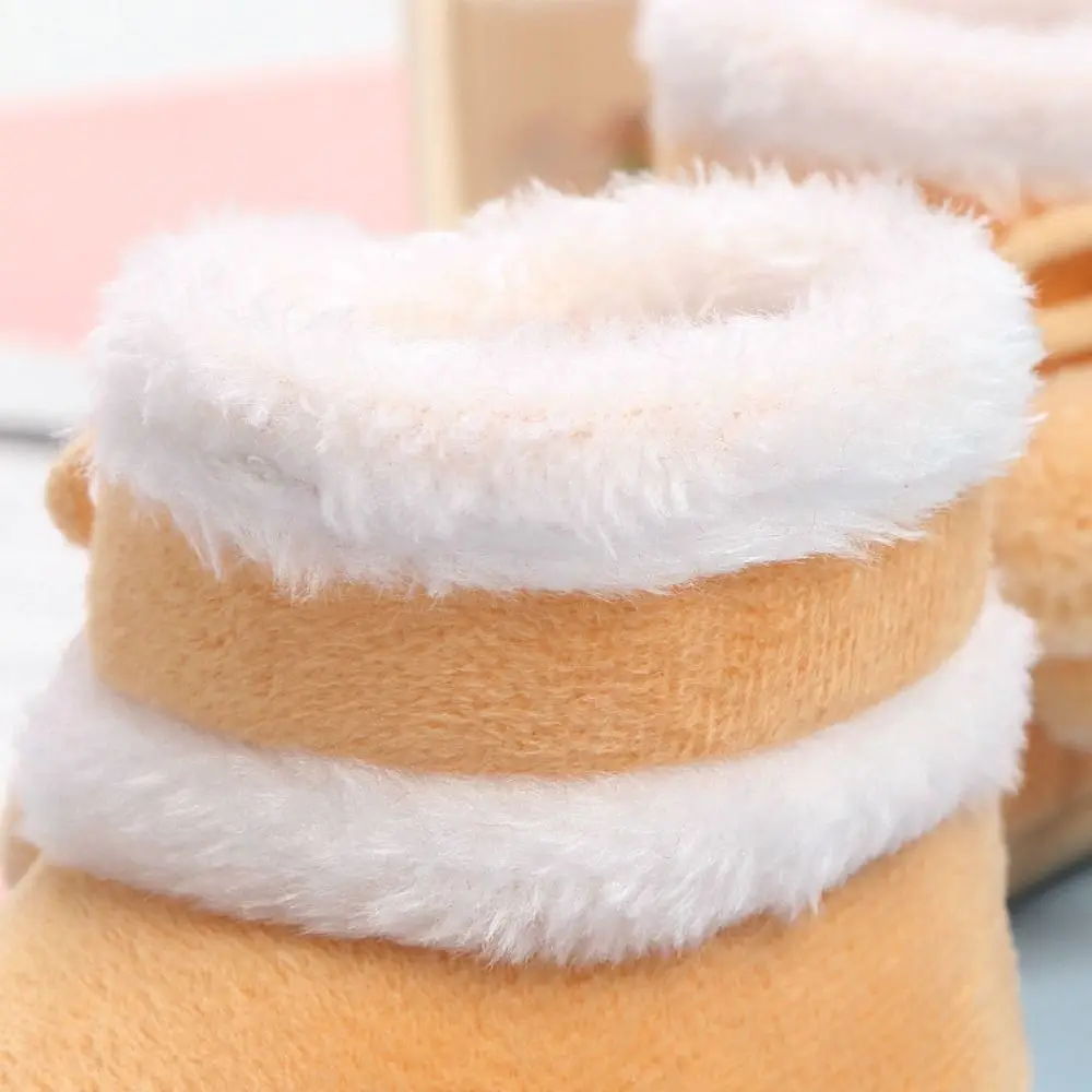 Botas de nieve de lana para bebés cálidas con suela antideslizante