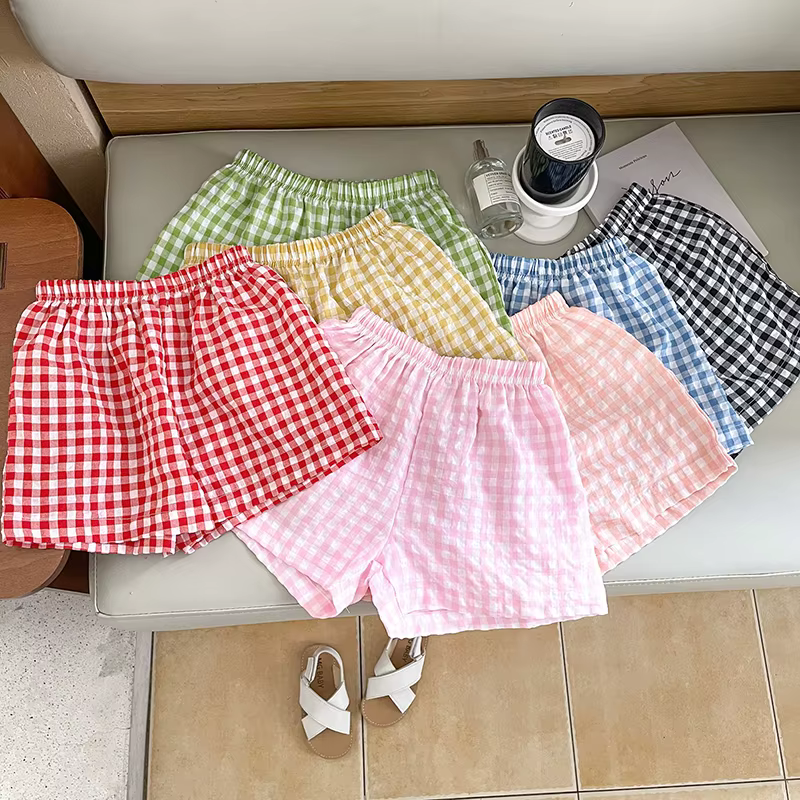 Pantalones cortos antimosquitos a cuadros para niña