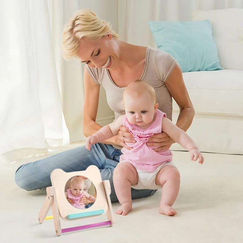 Tablero de madera ocupado con espejo para bebés
