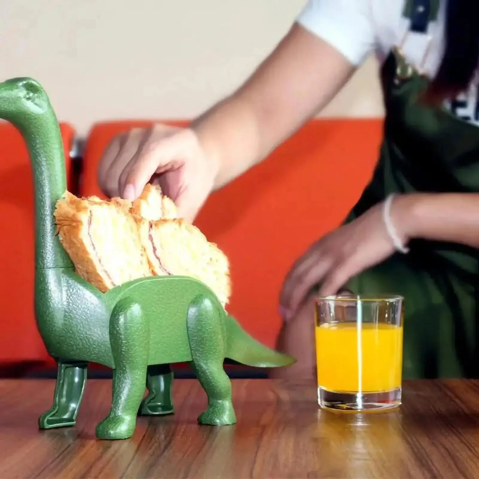 Soporte con diseño de dinosaurio para tacos