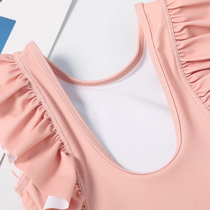 Traje de baño una pieza para niña con volantes y gorro - imagen 4