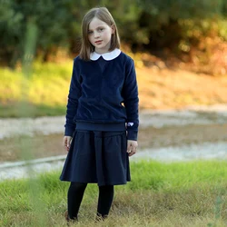 Falda plisada azul marino y camiseta de algodón para niña