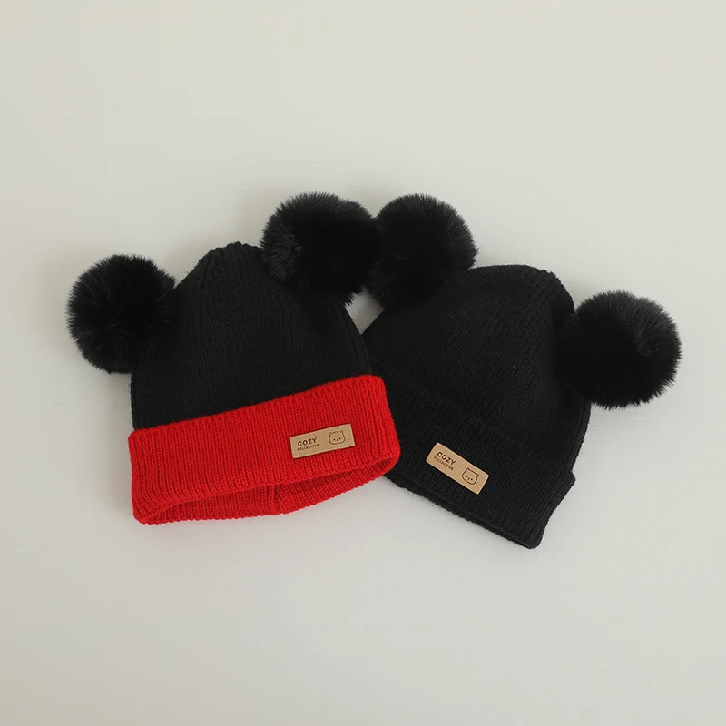 Gorro con pompón para niños