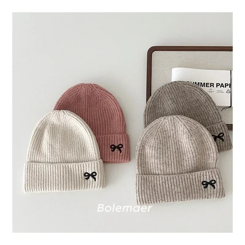 Gorro tejido con lazo bordado elástico para otoño e invierno - imagen 3
