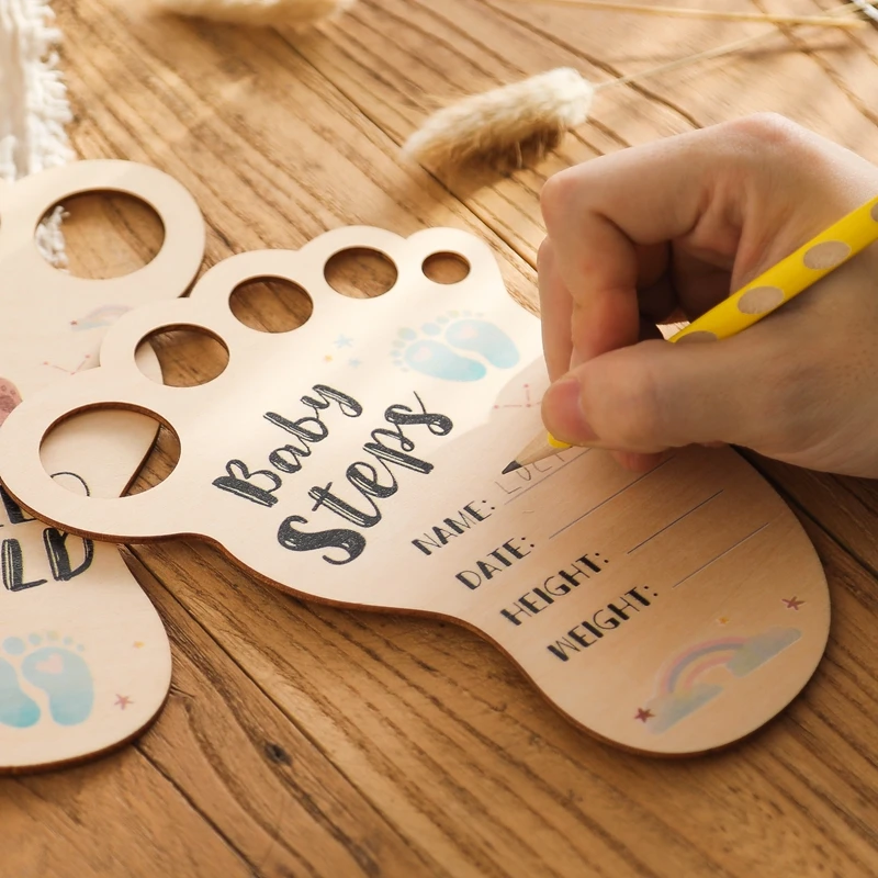 Two wooden milestone cards for baby photography