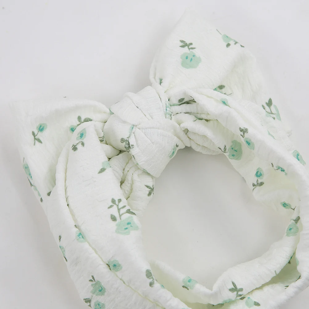 Diadema lazo floral elástica para bebé – Ajustable y suave - imagen 5