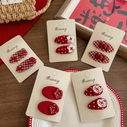 Pinza de pelo para niñas con lunares rojos y diseño manzana
