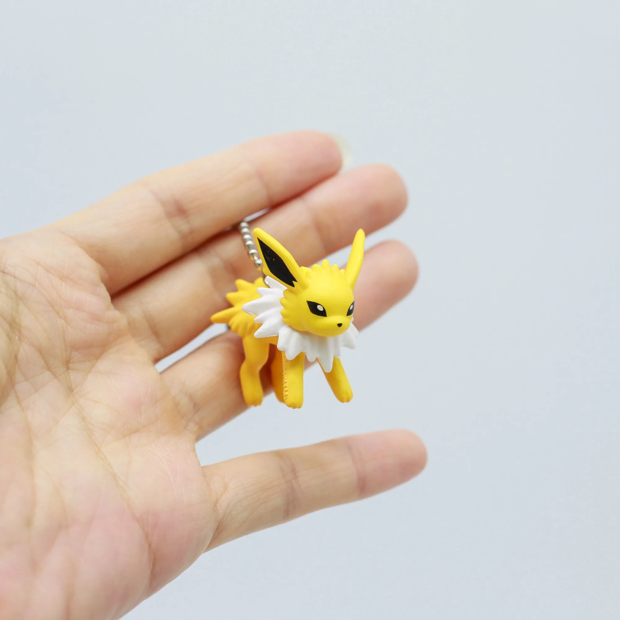 Figura de Pokémon Eevee y evoluciones – Caja sorpresa con llavero
