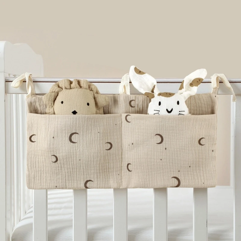 Organizador de cuna colgante con bolsillos para baberos y juguetes - imagen 2