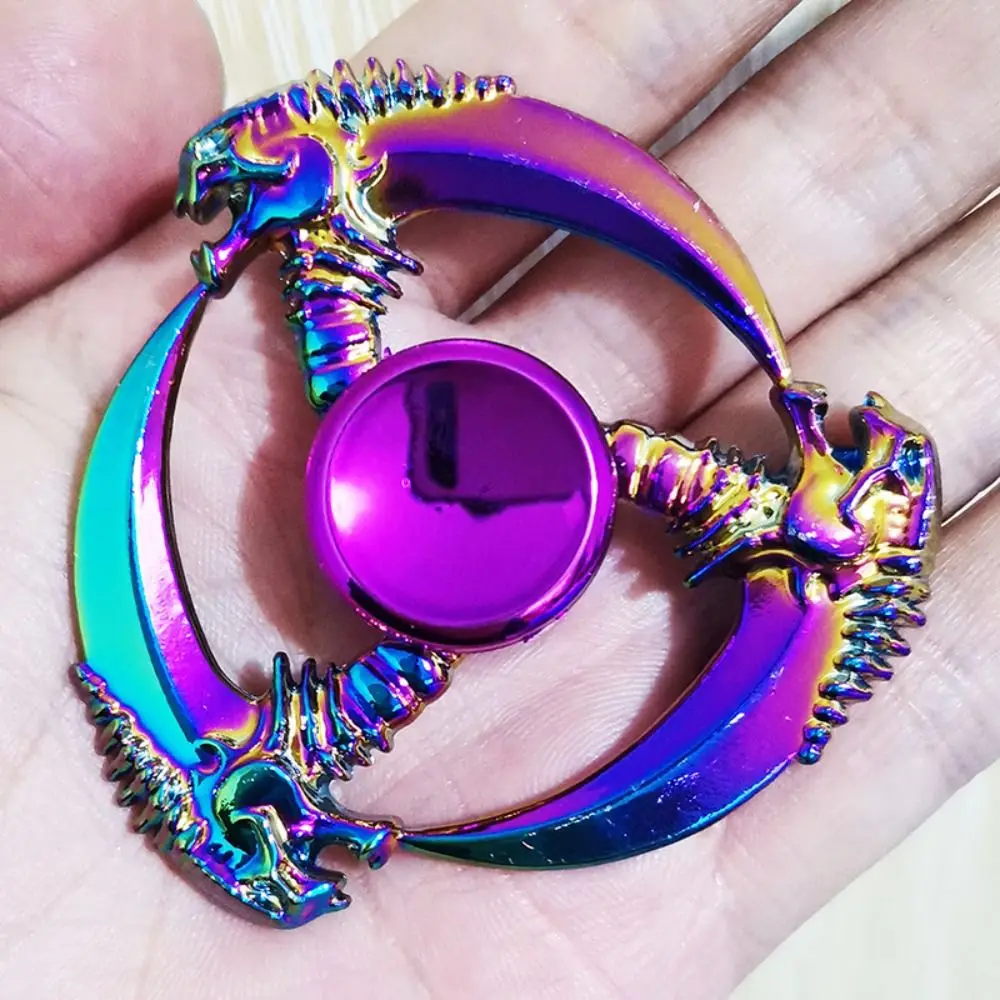 Spinner antiestrés alas de dragón arcoíris metálico para dedos - imagen 5