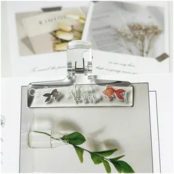 Pinza transparente de acrílico para sujetar cuadernos y documentos