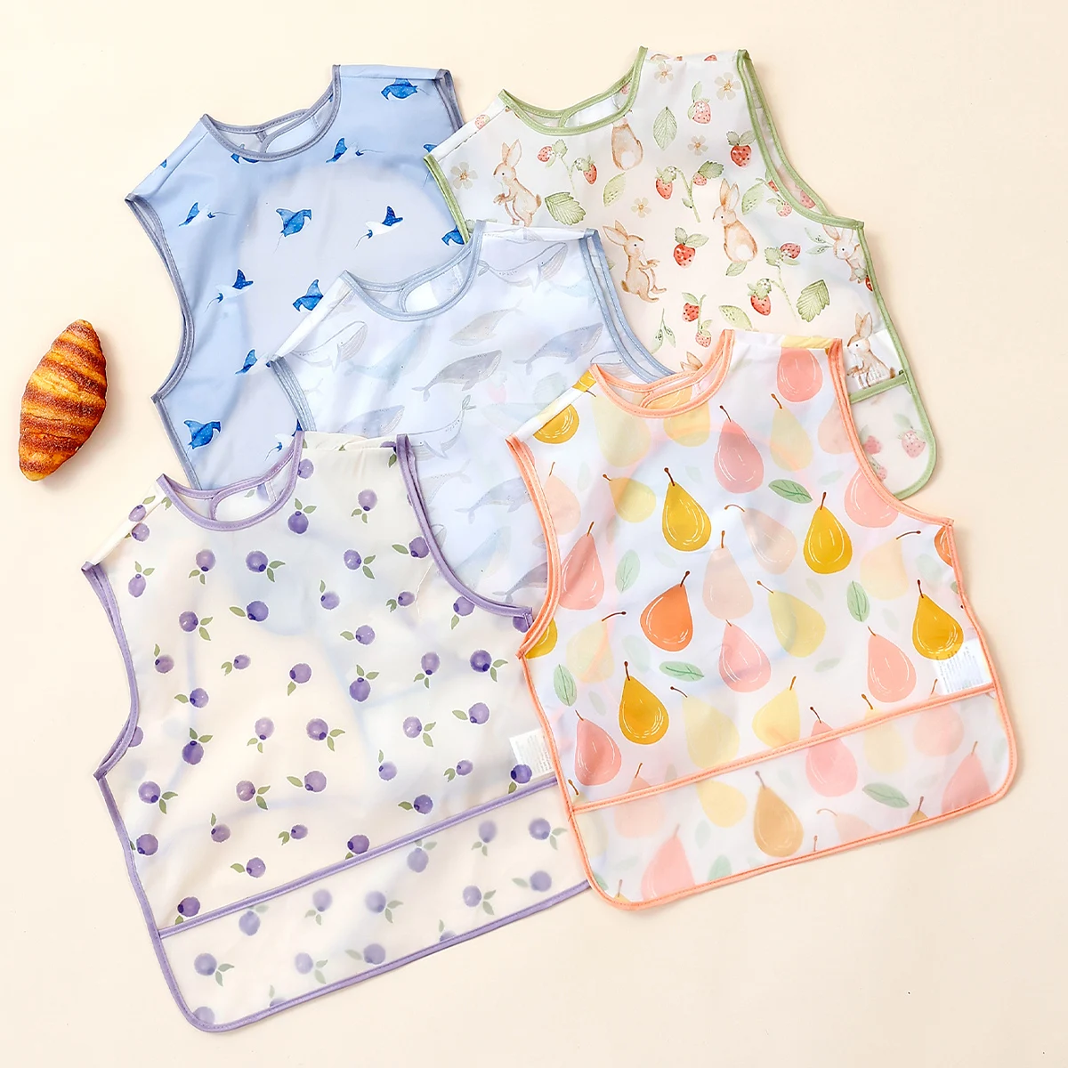 HappyFlute Babero impermeable con bolsillo – Dibujos animados