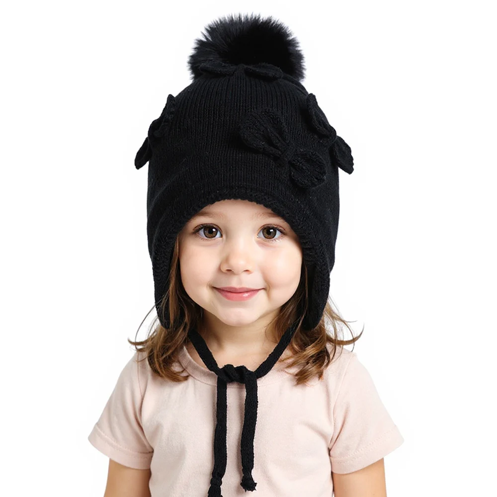 Gorro con orejeras tejido cálido, lazo y pompón para invierno