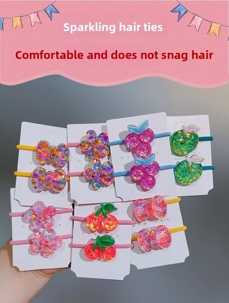 Lazos infantiles con flores y lentejuelas