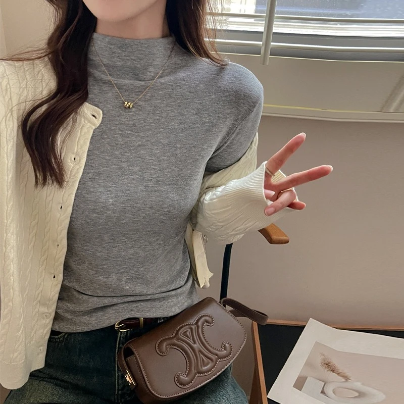 Cuello medio alto de la camiseta térmica